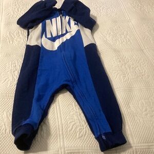Nike Blue and White Footies One Piece with Sporty Design zipper in front.